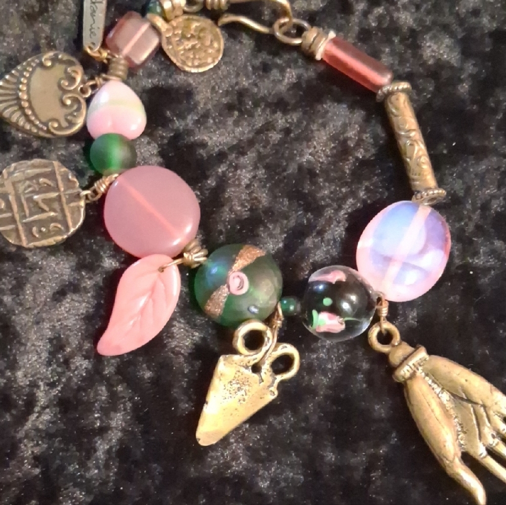 Gold and Pink Charm Bracelet with Vintage Aesthetic